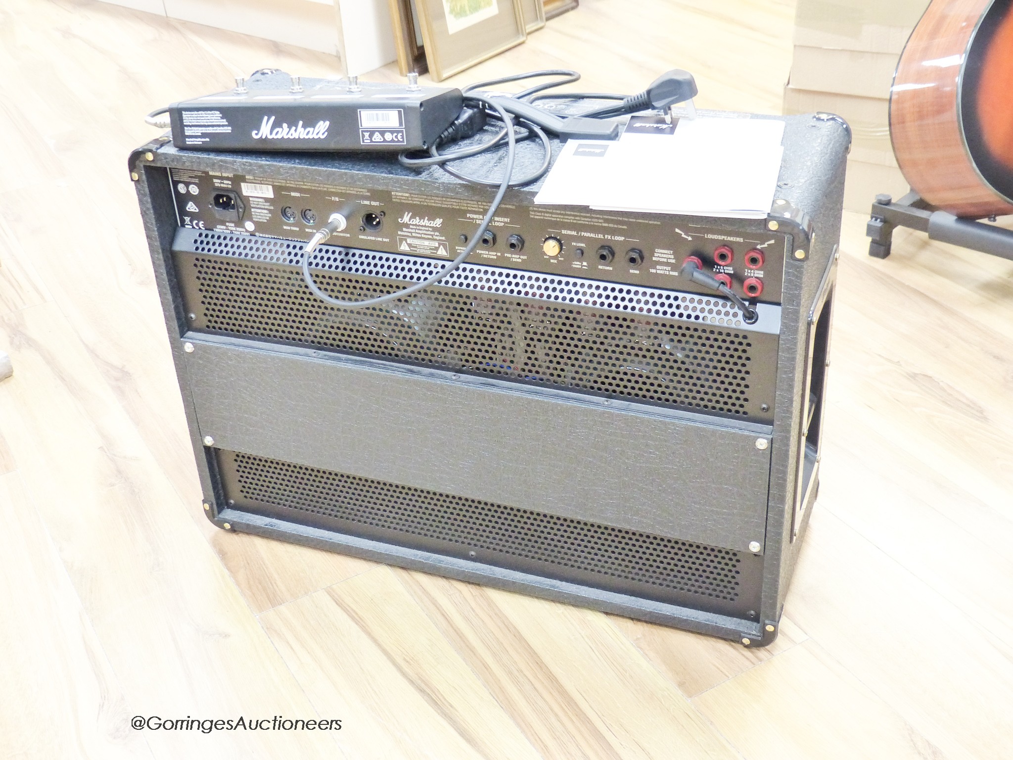 A Marshall JVM 210C 100 V valve amplifier with 4 way foot switch, c.2019